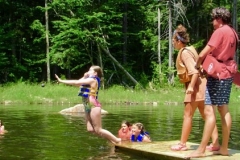 Girls Jumping into the Pond
